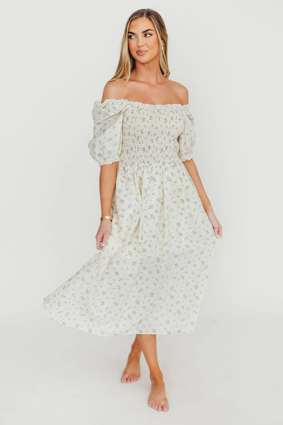 Kinsley Ditsy Floral Smocked Midi Dress in Sky Blue - Fashionser