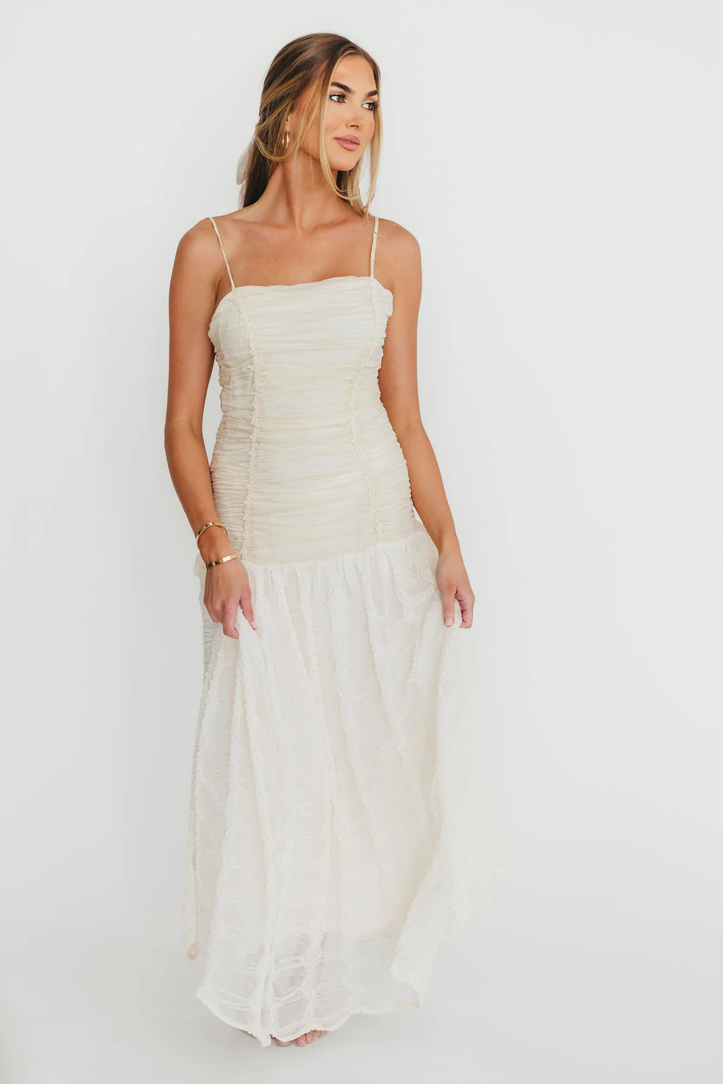 Rosie Ruched Maxi Dress With Bow Back Detail in Cream - Fashionser